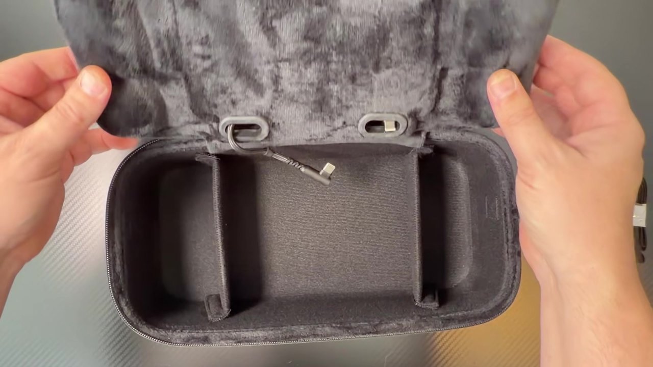 Lower storage layer of the JSAUX Double-Decker Steam Deck case with the tray lifted