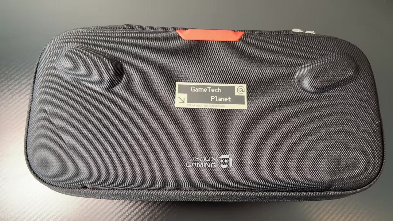 JSAUX Double-Decker Steam Deck case with a GameTech Planet name tag on the front