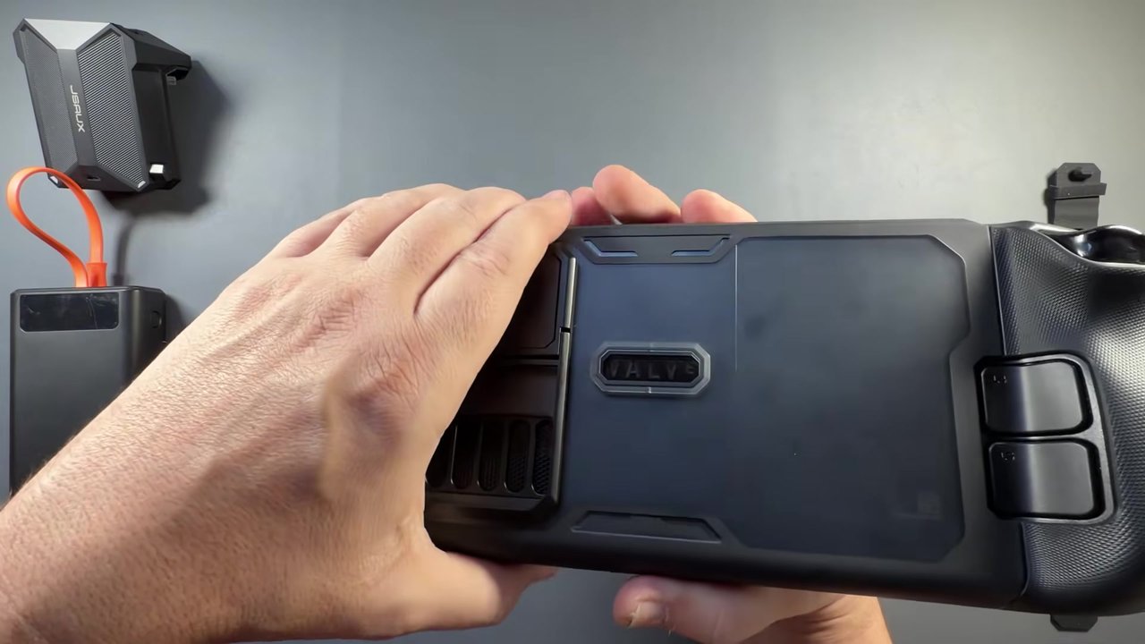 Steam Deck OLED in the JSAUX ModCase seen from the back with the kickstand