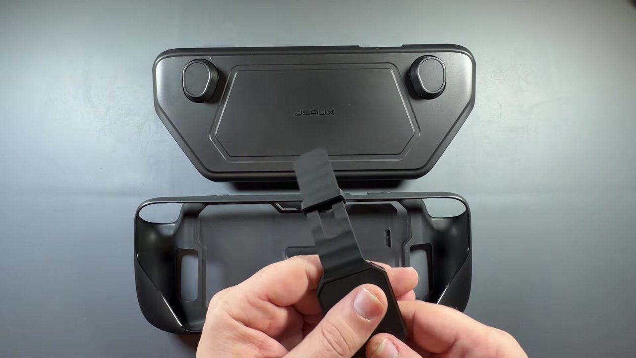 JSAUX ModCase accessory strap sliding onto the back of the case