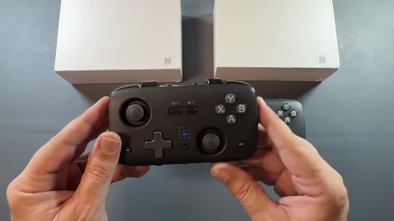 Bottom edge of the JSAUX SkyLark S1 Pro with mode, D1/D2, power and connection switches