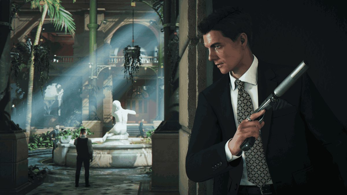 James Bond in a dark suit holding a silenced pistol in a courtyard with a fountain