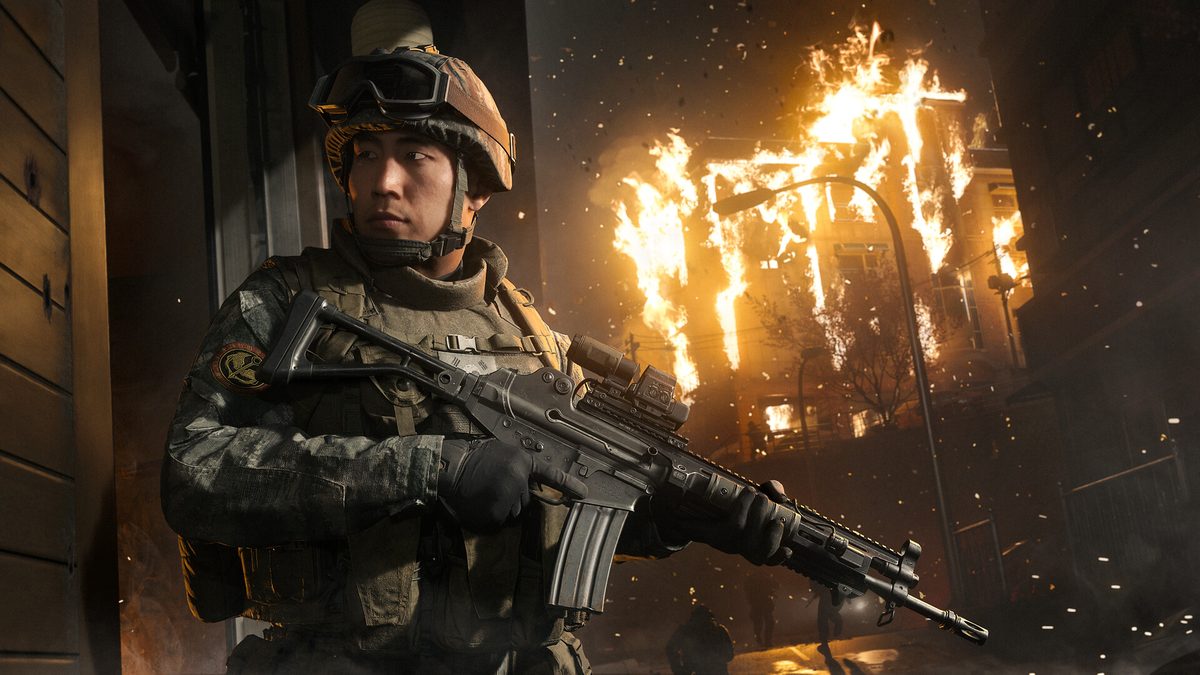 Call of Duty: Modern Warfare 4 screenshot of a soldier holding a rifle in front of a burning building at night