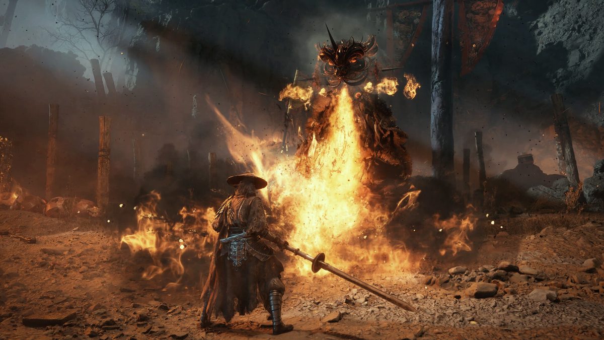 Phantom Blade Zero screenshot of a straw-hatted swordsman facing a flaming enemy