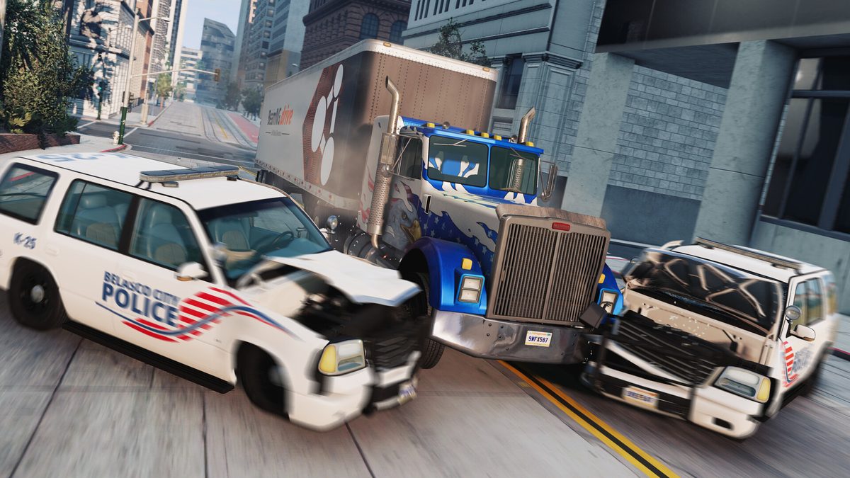 BeamNG.drive screenshot of a semi truck crashing into two police SUVs on a city street