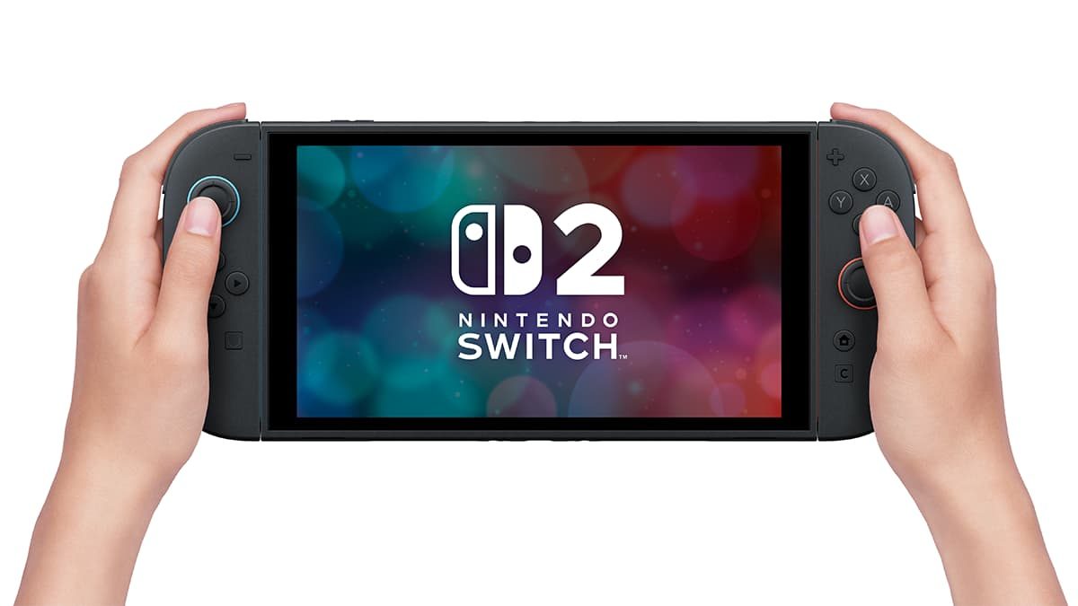 Two hands holding a Nintendo Switch 2 in handheld mode with the Switch 2 logo on screen
