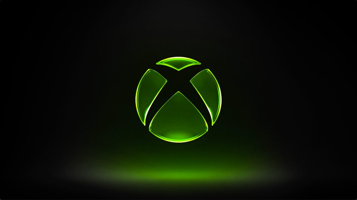 Glowing green Xbox logo on a black background